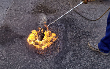 Downhill flat roofing repairs